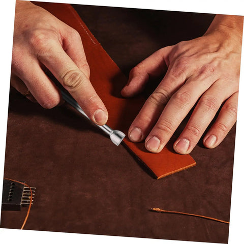 Leather Craft Tool Set 20Pcs Saddle Stamp Punch Kit For Leather Stamping And Carving Patterns On Belts Wallets And Bags in use on leather.