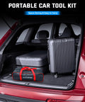 Portable car tool kit in trunk with suitcases, space-saving design for easy carry