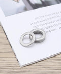 30Pcs Flat Washers 304 Stainless Steel 10x16x1mm Door Hinge Gaskets on a surface, silver finish