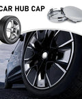 Four Piece Snap In Wheel Center Hub Caps With Slick Chrome Silver Finish And 60mm Outer Diameter mounted on a sleek car wheel.
