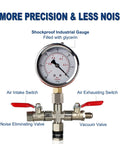 Front view of a stainless steel vacuum gauge manifold with two red valve handles