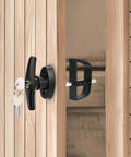 Lock It Down Shed Door Lock Latch 2 Pack Built Tough For Barns Garages And Sheds with black lever and keys on wood door.
