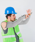 Industrial Grade White Cut Resistant Arm Sleeves Pro Level Forearm Protection For Welding Meat Processing And Auto Repair Tough As Nails Pe Guard Cover Set For Men And Women worn by a worker in a blue hard hat and green vest.