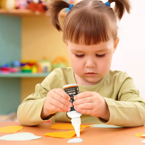 Child using Fast Dry Sew Glue For All Fabrics Quick Bonding Liquid Adhesive For Clothing Repair Denim Leather Cotton 60ml