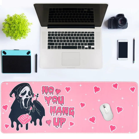 Pink Large Gaming Mouse Pad 31.5 By 11.8 Inches Desk Mat With Anti Skid Rubber Base Soft Comfortable And Durable Surface Built For Gaming And Office Use Perfect For Precise Mouse Control And Long Marathon Sessions Epic Comfort on a desk setup with a laptop, camera, and plant.