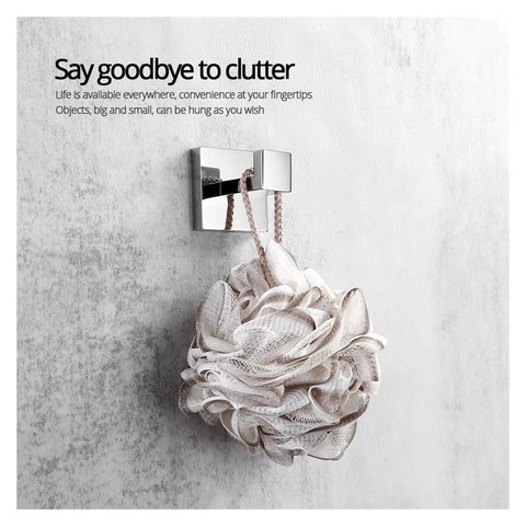 Premium Stainless Steel Heavy Duty Towel Hook Wall Mounted robe hook holding a shower pouf on a concrete wall.