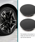 Street Ready Wheel Center Caps 4 Pack Rust Proof Hub Covers No Sweat Snap In Anti Drop Rim Medallions Tough Steel Bracket Universal Slick Black Car Truck Bling Setup positioned on a vehicle wheel.