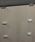 2 Inch Edge Pull In Polished Chrome For Cabinets And Drawers installed on furniture, showing modern sleek hardware upgrade in a kitchen or bath.