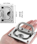 Close-up of hand holding Two Pack Marine Flush Ring Hatch Pull Handles For Boat Decks And Cabinets Recessed 316 Stainless Steel