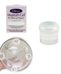 Clear Museum Gel Adhesive For Securing Collectibles And Decor Removable And Reusable Non Toxic Formula 4 Oz Container with packaging