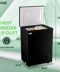 Compact Black Chest Freezer With 3.5 Cubic Feet Capacity, Space Saving Top Open Design, Hella Roomy Interior For Meat And Seafood Stashes, Plus Adjustable Thermostat To Keep Groceries Locked And Loaded Year Round, visible with open lid and storage boxes.