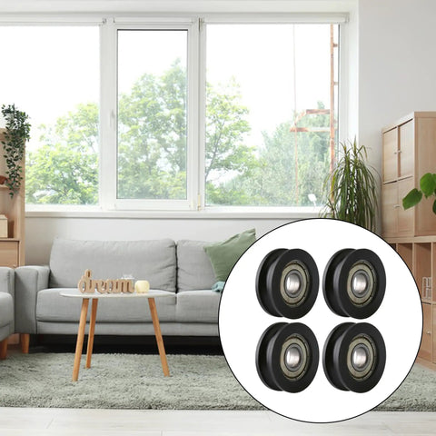 Four Piece U Type Black Pulley Wheel Set With 8mm Shaft Hole And 30mm Diameter For Smooth Rolling Rails Heavy Duty Replacement Roller Bearing Max Load 99kg Ideal For DIY Projects Equipment Upgrades And Garage Setups. 4 black pulley wheels