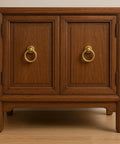 Wooden cabinet with Antique Brass Ring Cabinet Pulls Set Of 2 for dresser drawers, vintage solid brass hardware detail visible.