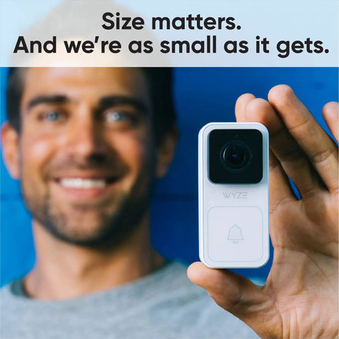 Chime Receiver For Wired Video Doorbell White, Real Time Home Alerts, Adjustable Volume shown in hand