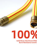 Close-up of yellow garden hose with brass fittings and red stripe