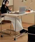 Rock Solid PC Desk With Smooth Gliding Casters And Built Tough Frame For Home Office Setup featuring a mobile workstation with a laptop.