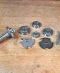 Replacement Router Bit Bearings For High RPM Performance, tools and components on wooden surface