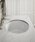 Undermount Single Bowl Bath Sink With Sealed Overflow In White Vitreous China, Durable Under Counter Design installed in marble countertop