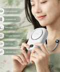 Woman using Portable Neck Fan USB Rechargeable 3 Speed Mini Personal Handheld Fan On The Go Travel Makeup Eyelash Care Outdoor Office