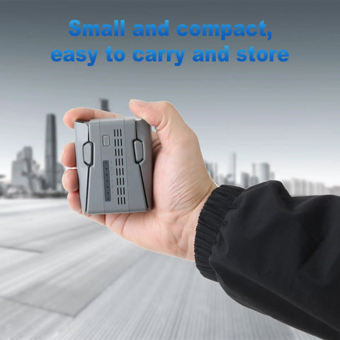 Hand holding Two Way 45W PD Charging Hub for Neo 2 Drone Battery Charger with compact design