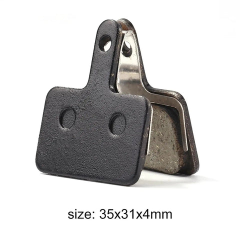 Fifteen Pair Top Shelf Bicycle Brake Pads Resin Compound Rotor Replacement For Hydraulic Disc Systems With Killer Grip Stopping Power And Ride Easy Durability, 35x31x4mm size, showing detail of resin and metal construction.