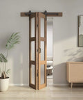 32 Inch Bifold Glass Barn Door Kit with hardware, 3-panel solid wood slab with frosted glass, brown PVC surface, installed view