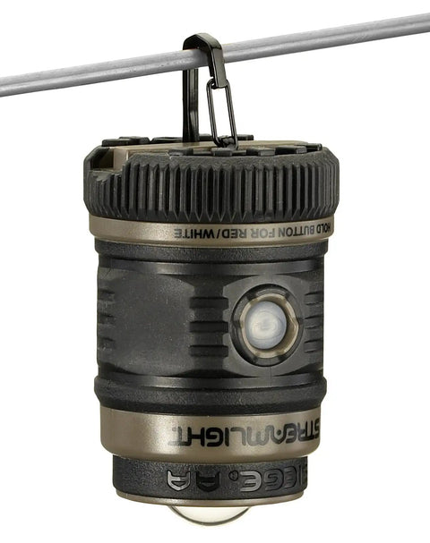 Siege AA 200-Lumen Lantern With White And Red LEDs For Camping And Emergencies hanging on wire, compact coyote design