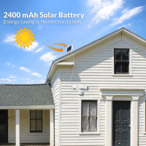White house with Solar Powered Motion Sensor Outdoor Light With 1600 Lumen White Flood Beams mounted near black door