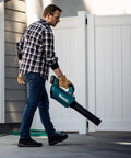 Renewed Brushless Cordless Leaf Blower being used by a man, ideal for yard work with high airflow and variable speed. 459 Cfm 116 Mph.