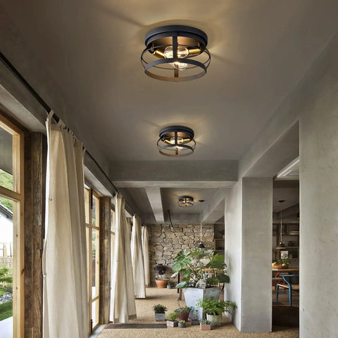 Three Light Ceiling Light Fixture In Modern Black Semi Flush Mount Chandelier installed in a stylish living room setting.