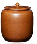 Hella Durable Ceramic Cereal And Rice Dispenser With Seamless Airtight Lid Slick Kitchen Storage Jar For Pantry Organization And Fresh Snacking On The Daily shown in brown ceramic finish.