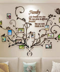 Antler Themed Family Tree Wall Art For Living Room With 3D Removable Picture Frame Collage, DIY Acrylic Stickers Featuring A Deer Head And The Family Like Branches On A Tree Quote For Cozy Home Decor displayed above a sofa