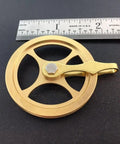 Replacement Grandfather Clock Pulley for Cable Movements One And Three Quarters Inch DIY Clock Assembly Kit next to ruler