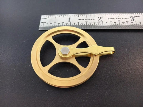 Replacement Grandfather Clock Pulley for Cable Movements One And Three Quarters Inch DIY Clock Assembly Kit next to ruler