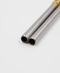 Close-up of two stainless steel heads on Double Head Gas Torch For MAPP Tank With Two Stainless Steel Heads, Dual Flame Burner, Higher Heat Output.