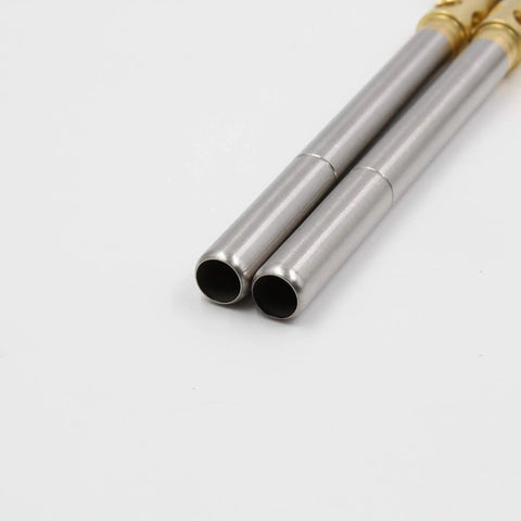 Close-up of two stainless steel heads on Double Head Gas Torch For MAPP Tank With Two Stainless Steel Heads, Dual Flame Burner, Higher Heat Output.