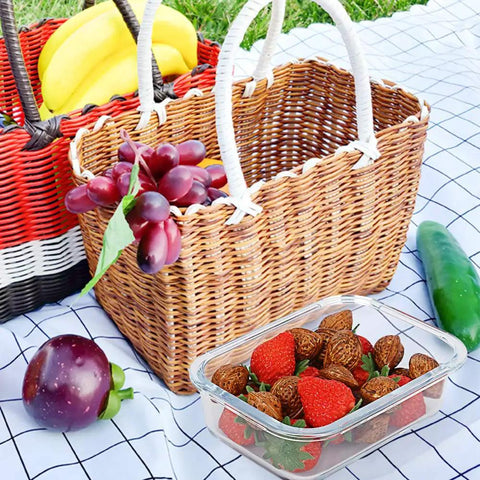 Ten Pack 22 Oz Glass Meal Prep Containers With Lids Durable Borosilicate Glass next to wicker basket on picnic blanket.