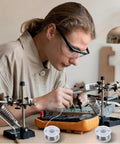 Person soldering a circuit with 63-37 Tin Lead Rosin Core Solder Wire For Electrical Soldering 0.6mm Diameter 50g Reel Pro Grade Low Melting Point 183 C