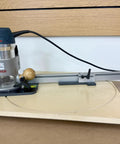 Adjustable Circle Cutting Jig For Routers Knocks Out Perfect Curves From Four To One Hundred Eight Inches Wide with Bosch router on plywood.