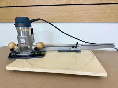 Adjustable Circle Cutting Jig For Routers Knocks Out Perfect Curves From Four To One Hundred Eight Inches Wide with Bosch router on plywood.