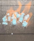 Flame igniting on blue-white material, showcasing Heavy Duty Waterproof Roofing Tape Roll For Asphalt Shingle Repair.