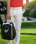 Person holding Personalized Golf Shoe Bag For Men And Women With Custom Monogram And Embroidered Initials on golf course.