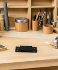 Hidden Door Hinge 5 Inch Black Concealed Pivot For Cabinets And Secret Doors Heavy Duty Invisible Cabinet Hardware on workbench