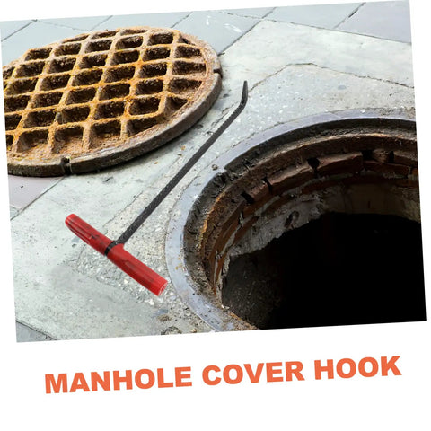 Heavy Duty Manhole Cover Lifter Hook Rock Solid Steel Build With Secure Comfort Handle And Slick T Shape Design For Quick Grate Drain Lid And Roller Shutter Access Without Any Fuss At All, showing a red handled hook next to a manhole.