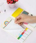 Teaching Is A Work Of Heart Sticky Notes Set For Teachers hand flipping notepad with colorful tabs and inspirational text