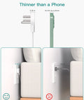 Ultra Slim Flat Plug Power Strip With Twelve Outlets And Three Sided Access Smooth Operator Five Foot Extension Cord shown with thin plug design.