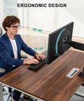 Single Monitor Arm Mount For 13 To 34 Inch Screens, Adjustable Desk Mount, shown installed on a wooden desk, ergonomic setup.