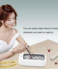 Woman using All In One Ultrasonic Glasses And Jewelry Cleaner 640ML 48KHz Powerful Sonic Cleaning Machine with glasses and jewelry