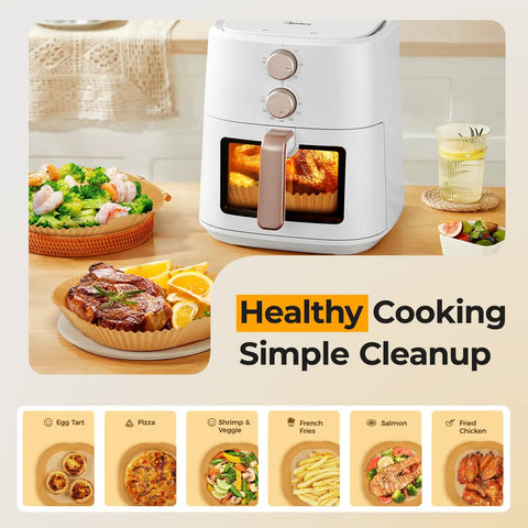 125 Pcs 8 Inch Square Air Fryer Liners Disposable Parchment Paper Nonstick Cooking Mats next to an air fryer with cooked meals.