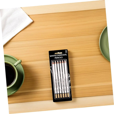 Six Piece White Sketch Pencils Set For Charcoal Drawing Artists And Newbies Soft Medium Hard Graphite displayed on a table